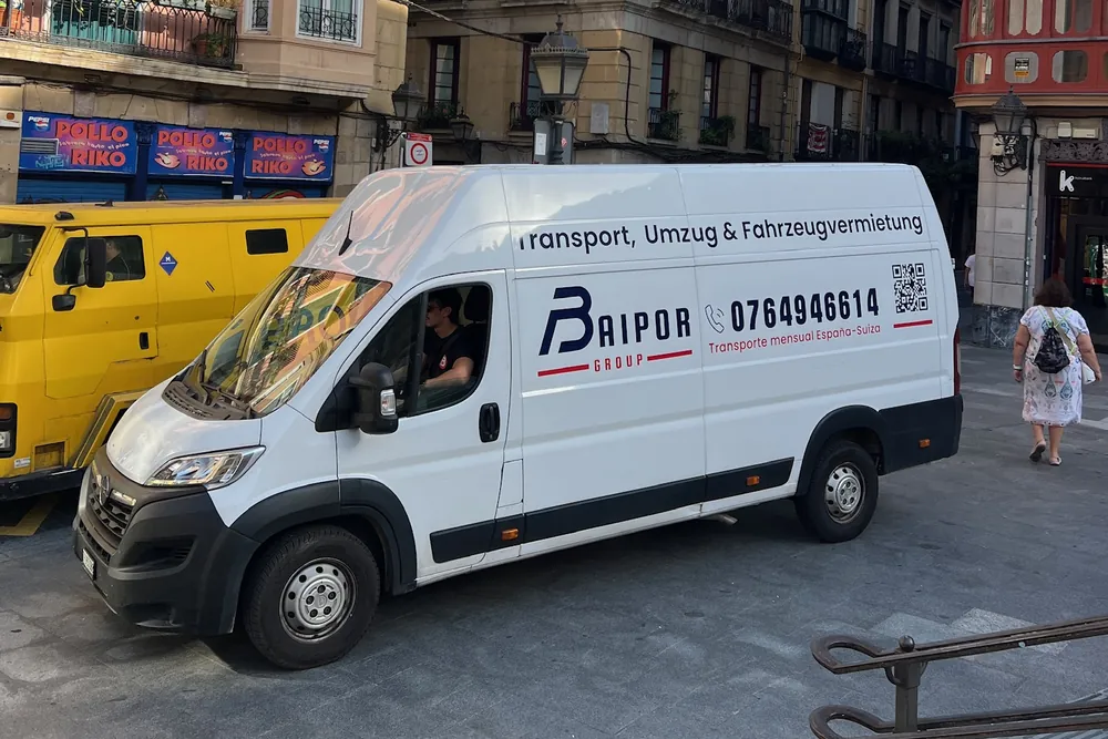 Branded Baipor van in an old-town street in Spain