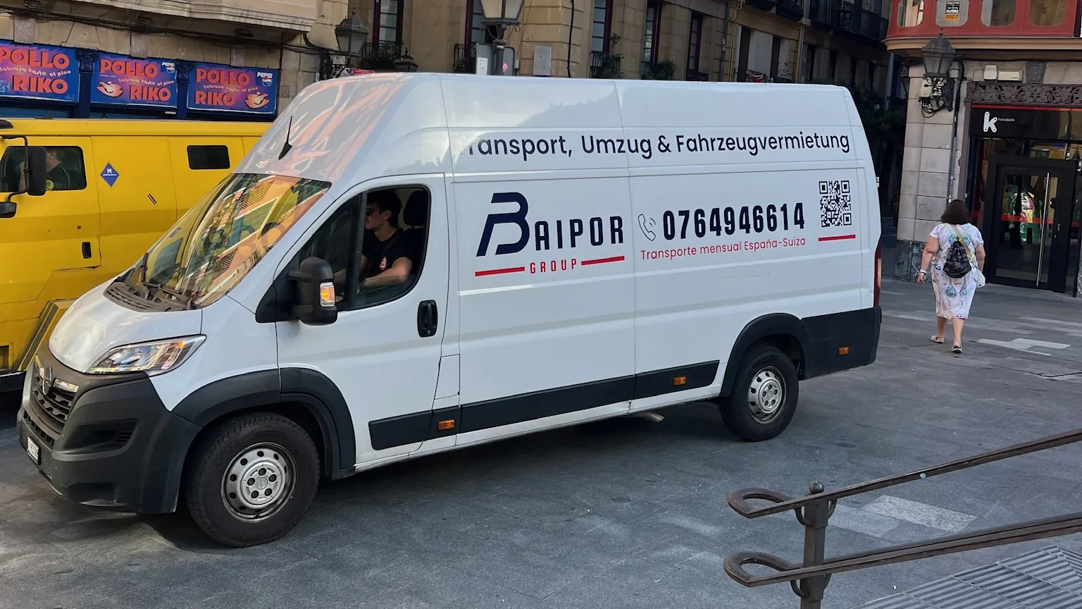 Branded Baipor van in a street in Spain, at the end of the route from Switzerland